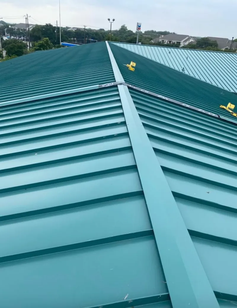 Green commercial metal roof ridge and valley for Metal Roof Repair in Wahpeton